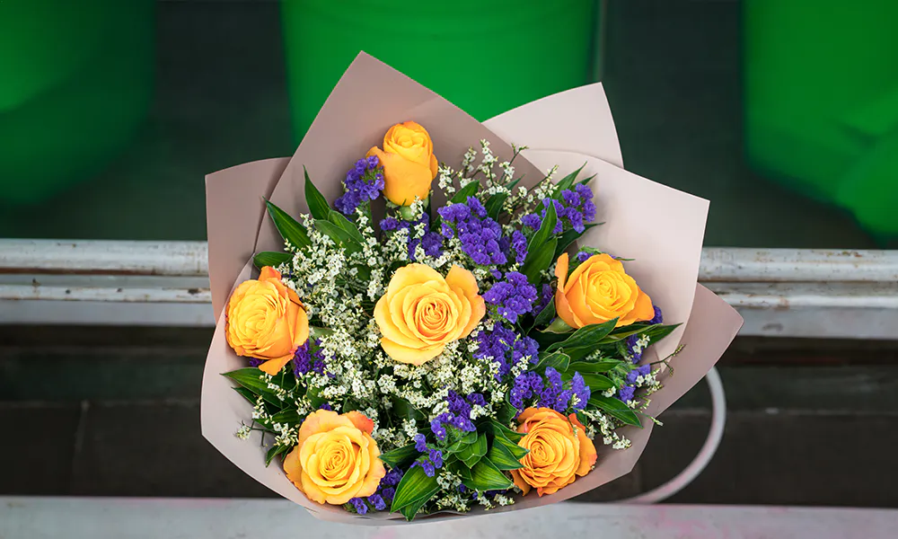 Wedding Anniversary Flowers: The Perfect Blooms for Each Year 25 50th Anniversary: Yellow Roses and Violets